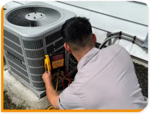 HVAC tech working on residential AC unit