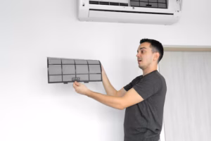 Man holding HVAC filter